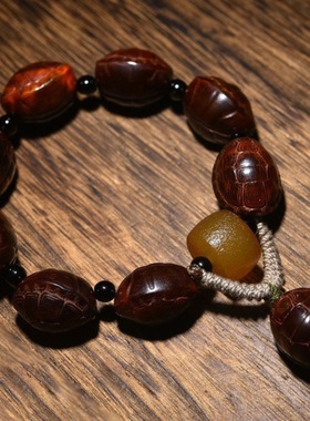 藏式血红牦牛角手串雕刻富甲天下