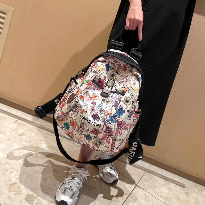 达芙露迪品牌双肩包女2025时尚休闲女士背包牛津布帆布外出旅游包