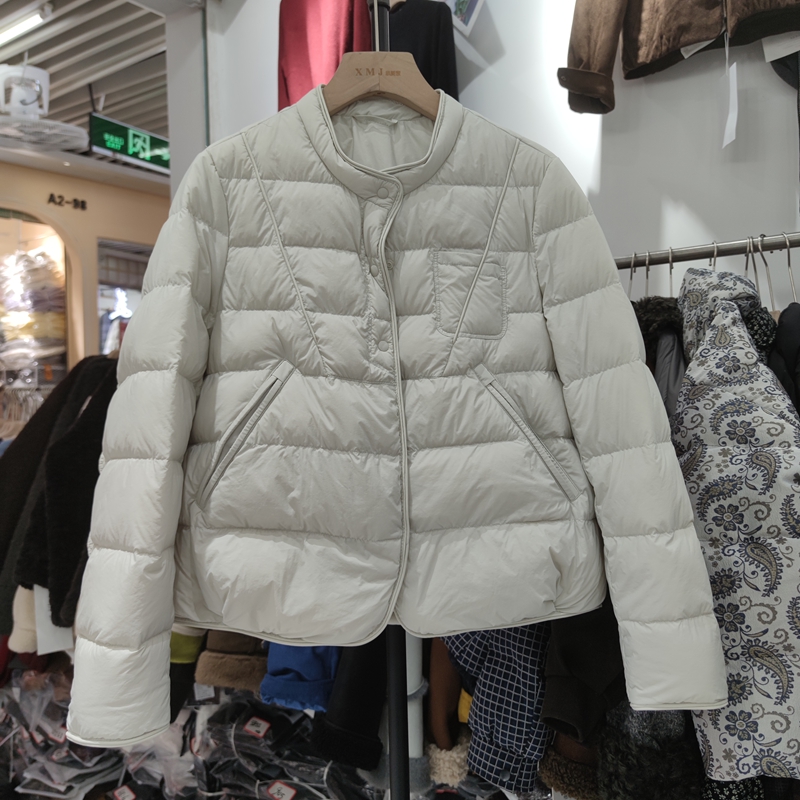 892A09冬季新款女小立领长袖纯色羽绒服外套宽松简约压花短款