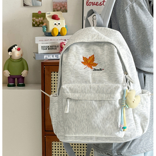 可爱枫叶刺绣书包女学生大容量百搭通勤双肩包休闲时尚纯色背包潮