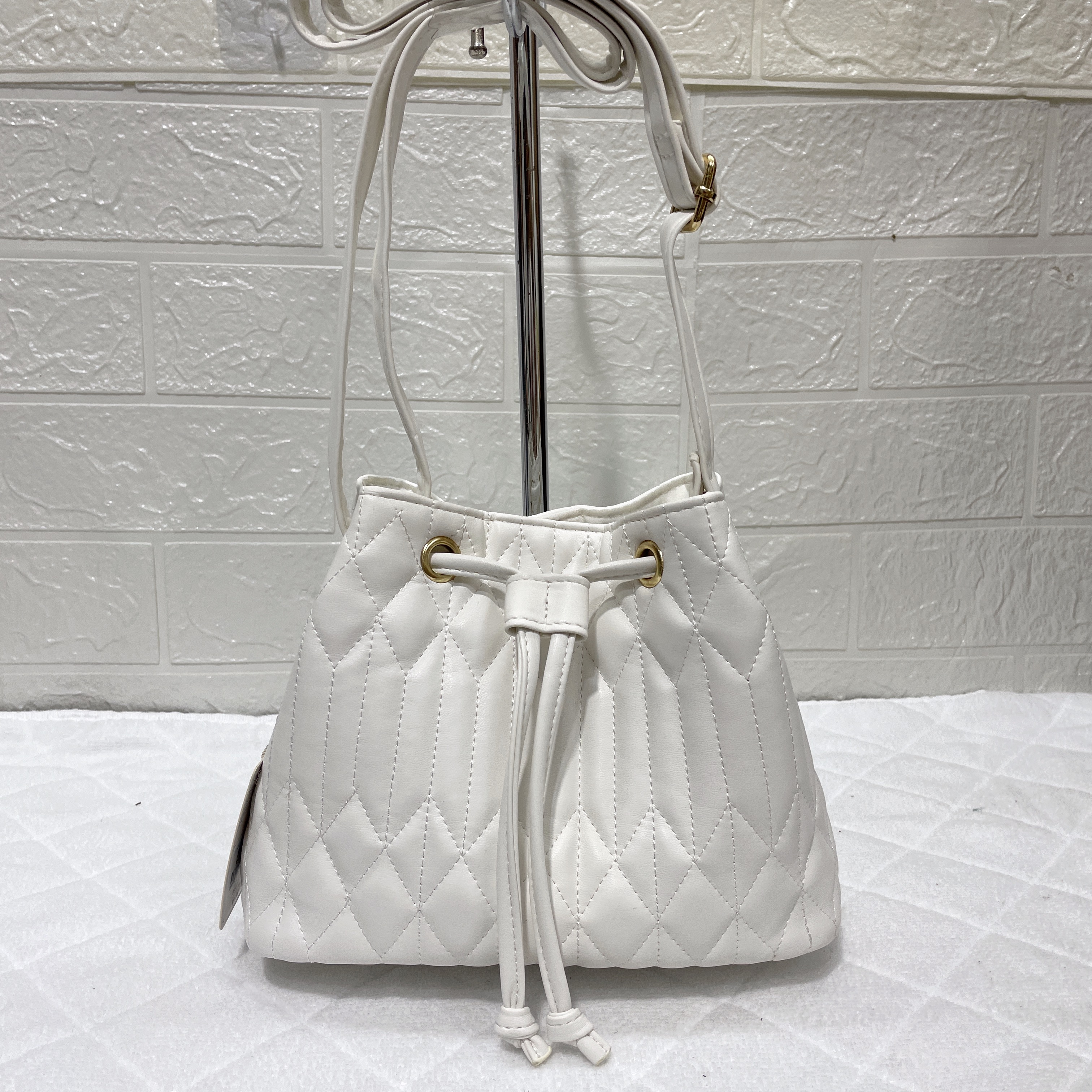 外贸英国primark时尚女包高级感百搭PU抽绳水桶包 单肩斜挎包