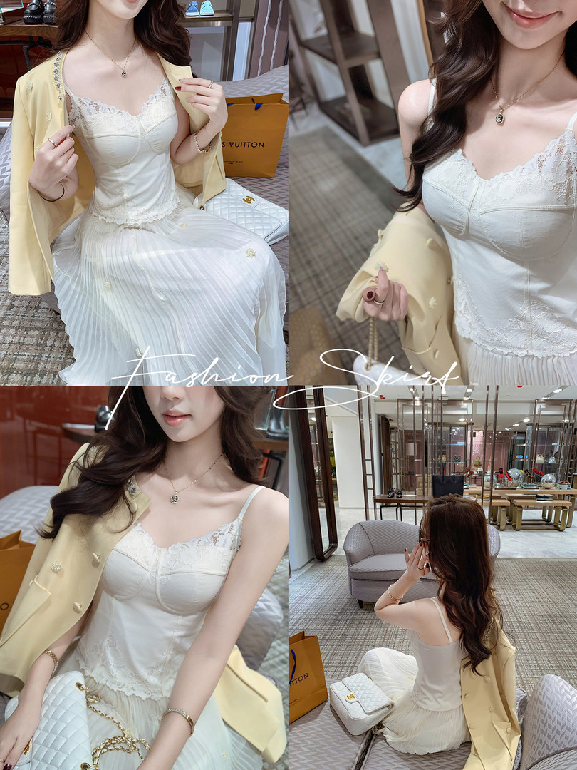 Model wearing a white lace camisole dress with a light yellow cardigan