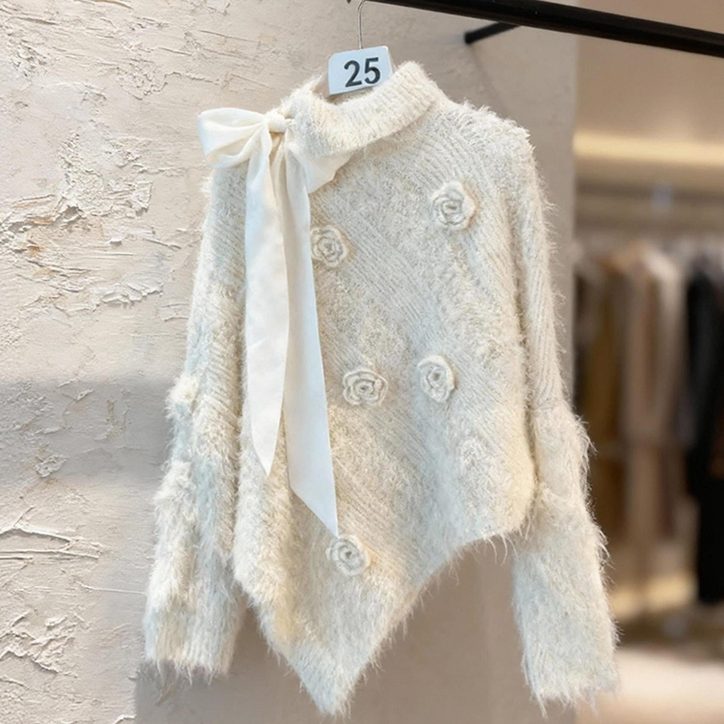 毛衣女款2025新款别致独特设计感不规则蝴蝶结气质法式杏色针织衫,女装/女士精品,毛衣,淘宝优惠券,粉丝福利购,淘宝优惠卷