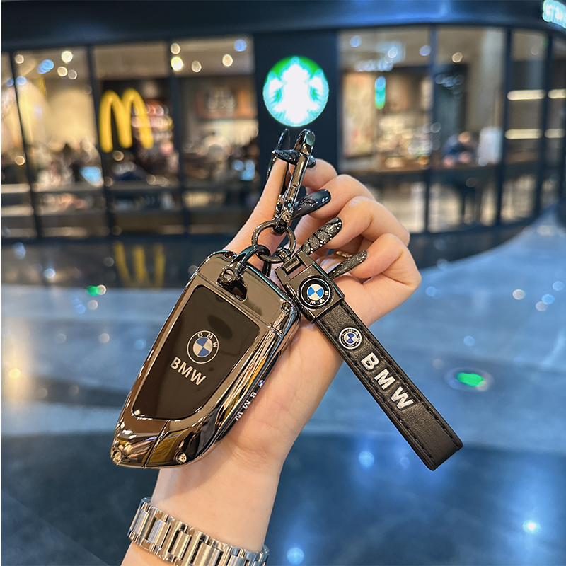 适用宝马5系钥匙套X5X6X3x2X1新3系1系高档7系530壳扣320li包金属