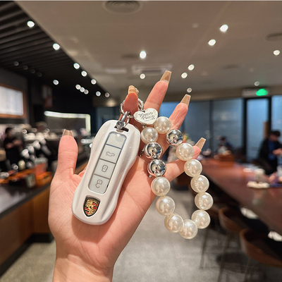 适用保时捷卡宴钥匙套Panamera帕拉梅拉911扣Macan包Taycan壳女