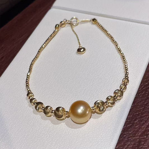 天然真珍珠正圆设计师款猫眼金球手链串镯金珠单颗轻奢送礼可调节