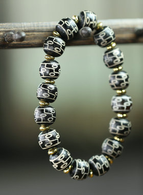 天然藏传黑玛瑙九眼天珠单圈手串