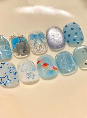 浅蓝海波穿戴甲金鱼贝壳星星