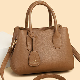 香港真皮头层牛皮女包2026新款简约纯色百搭大容量单肩斜挎包手提