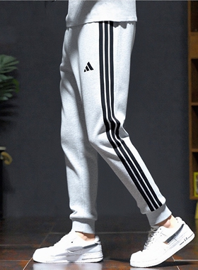 阿迪达斯男士加绒保暖运动长裤灰色收口束脚卫裤休闲裤冬季JE6318