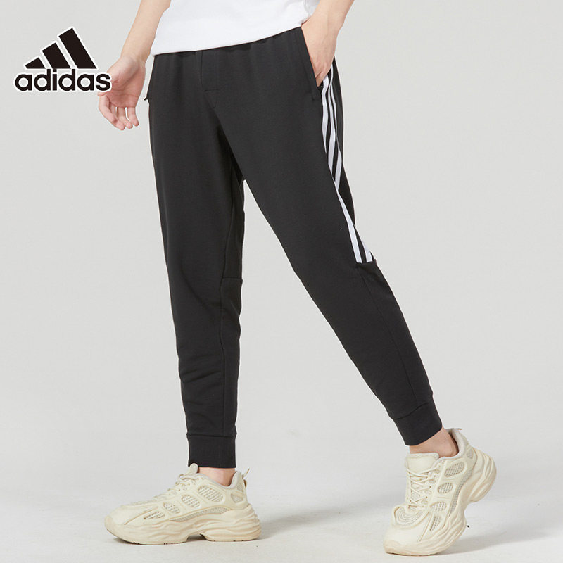 adidas阿迪达斯裤子男2026春季运动休闲跑步针织小脚长裤IA8182
