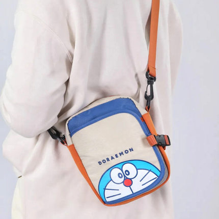 卡通可爱多啦A梦手机包证件票据收纳包单肩斜挎包多功能化妆包