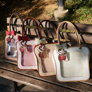 glory原创可爱吐司痛单肩斜跨手提蝴蝶结棉花娃娃痛包 morning