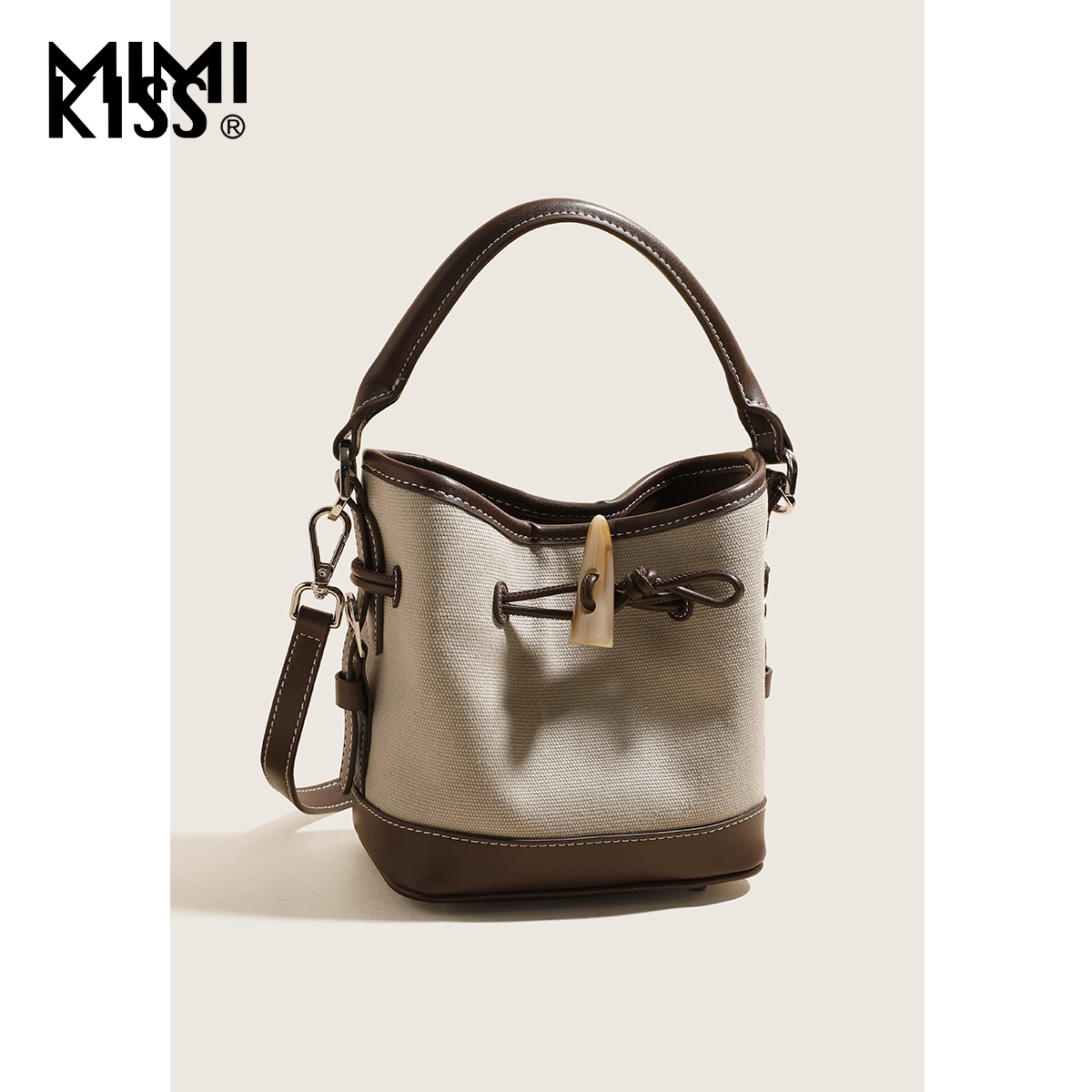 mimikiss手提水桶包包女式2025新款时尚百搭高级感小众设计斜挎包