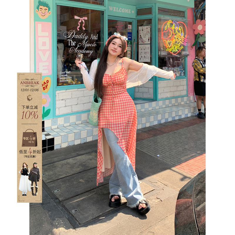 度假风A型格子不规则裙摆吊带裙