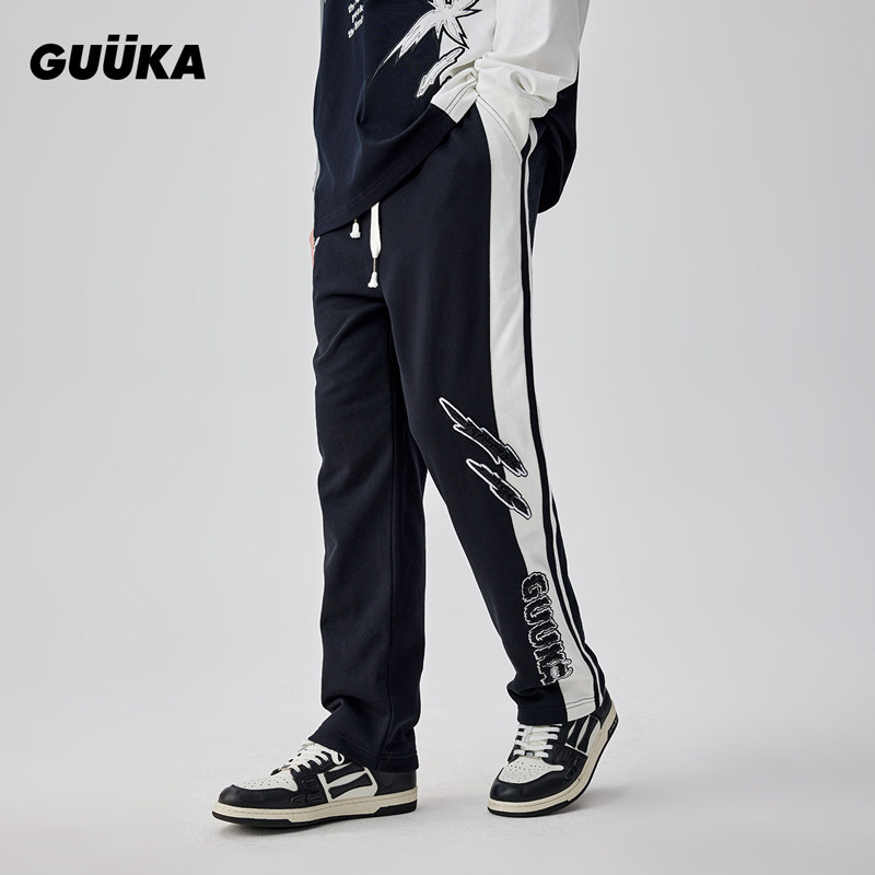 GUUKA黑色拼接卫裤男秋新款 青少年嘻哈小怪兽毛绒刺绣直筒裤宽松