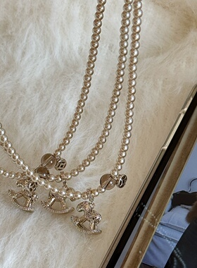 轻奢高级感摇摇木马钱币梦幻淡棕色茶晶珍珠毛衣链秋冬精致项链