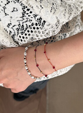 极细新年风红黑色手工编织鸽子血红石手绳叠戴简约S925银手饰女