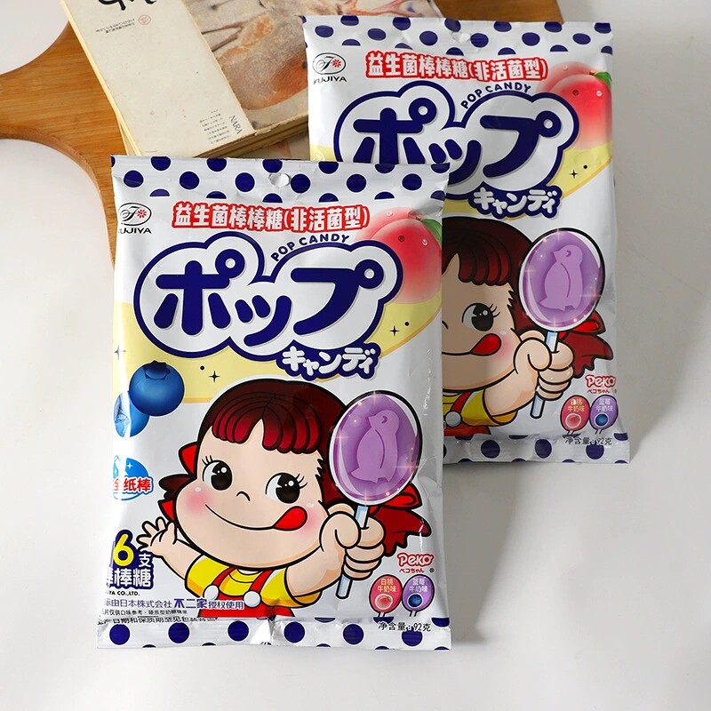 不二家白桃蓝莓牛奶混合双味益生菌棒棒糖儿童高颜值趣味造型零食