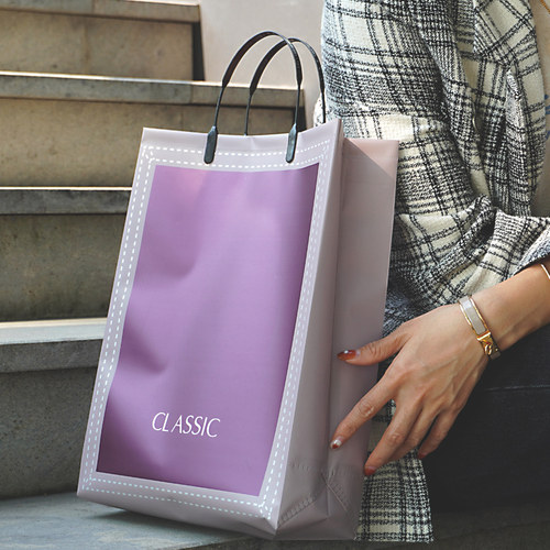 加厚免税店包装袋服饰竖版手提袋