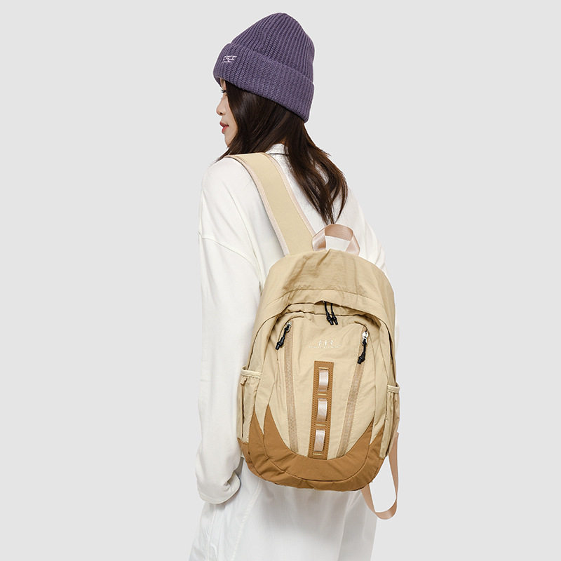 简约撞色男女同款2025新款初高中学生包百搭轻便电脑包旅行双肩包