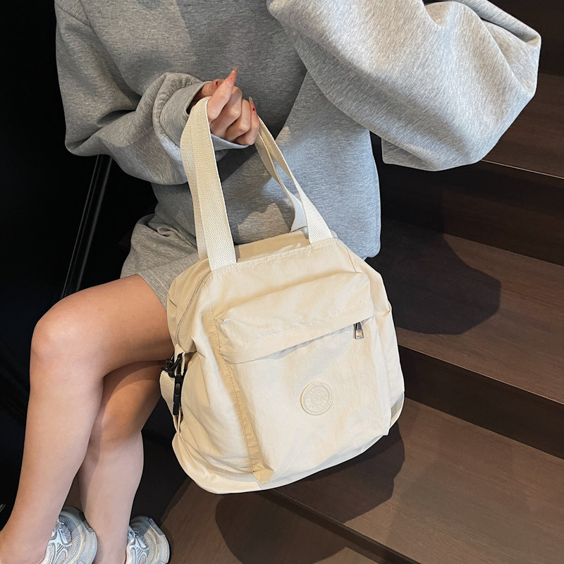 妈咪包手提手拎包斜挎2025新款多功能大容量妈妈母婴旅游轻便背包