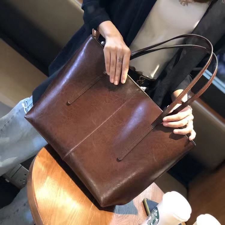 休闲大容量真皮包包手提单肩包