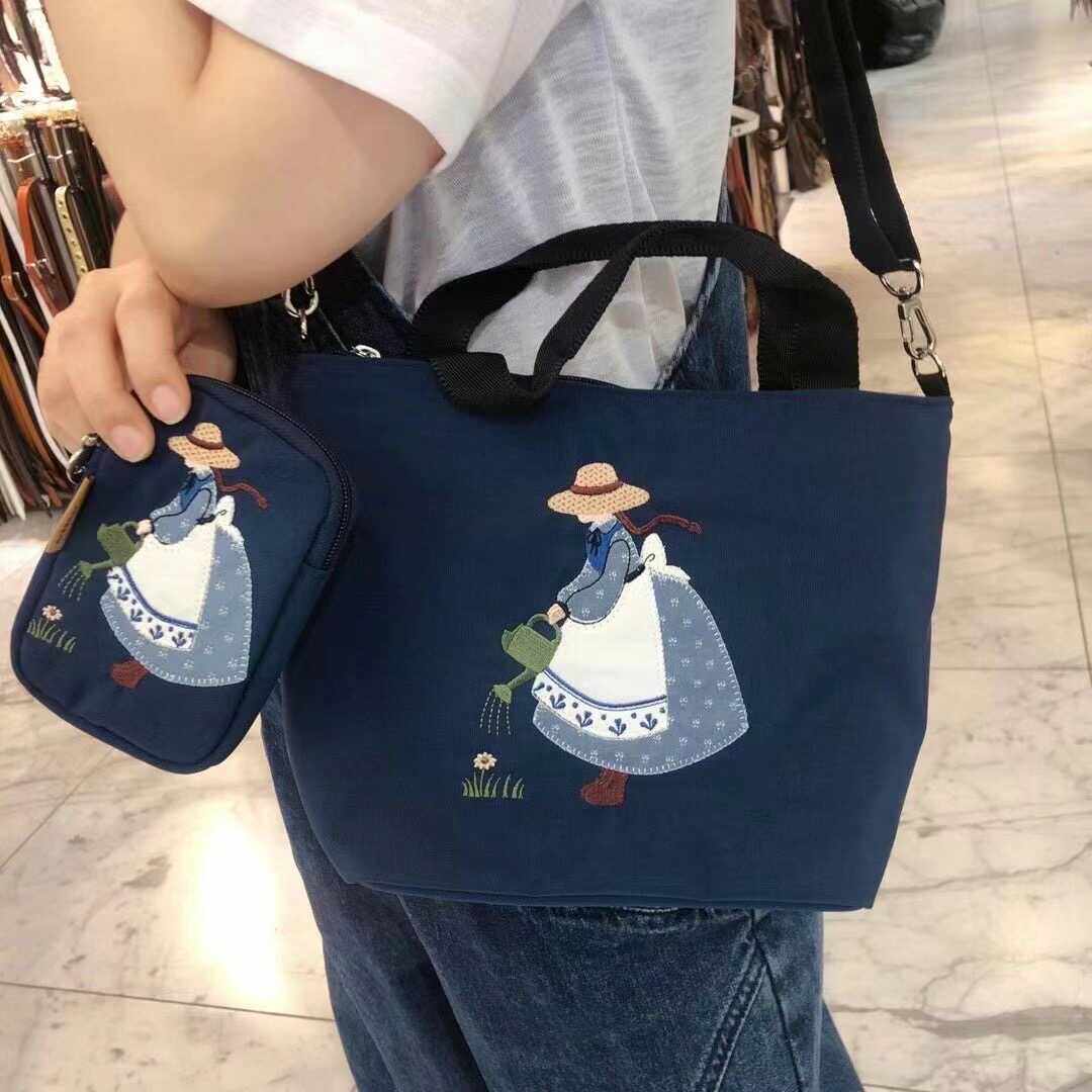 26高19.5底宽9cm花裙女孩手提包