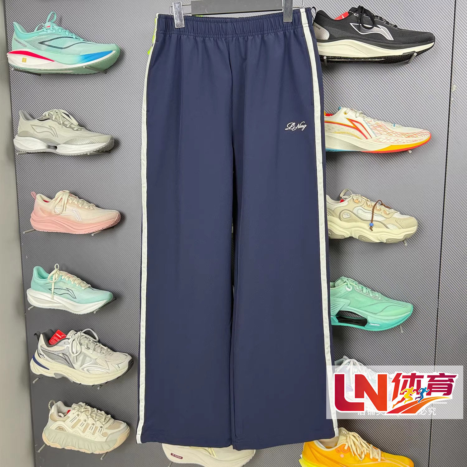 李宁休闲裤 2026春季新品女子时尚休闲直筒宽松运动长裤AYKW102