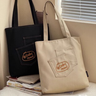 韩系文艺慵懒刺绣多口袋通勤单肩帆布包日常休闲百搭学生托特包袋