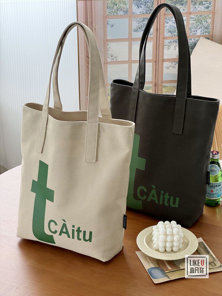 喜凡你帆布包字母文艺托特