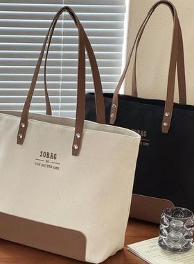 原创设计韩版简约高级通勤帆布托特文艺休闲百搭学生手提单肩包袋