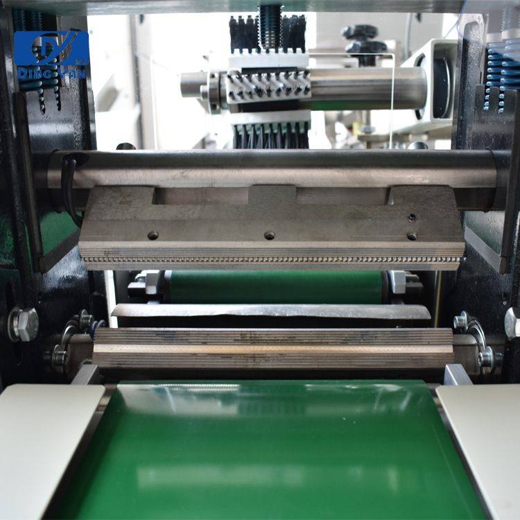 鼎研 定制糖果包装机 便携糖果式压缩面膜全自动转盘送料包装机