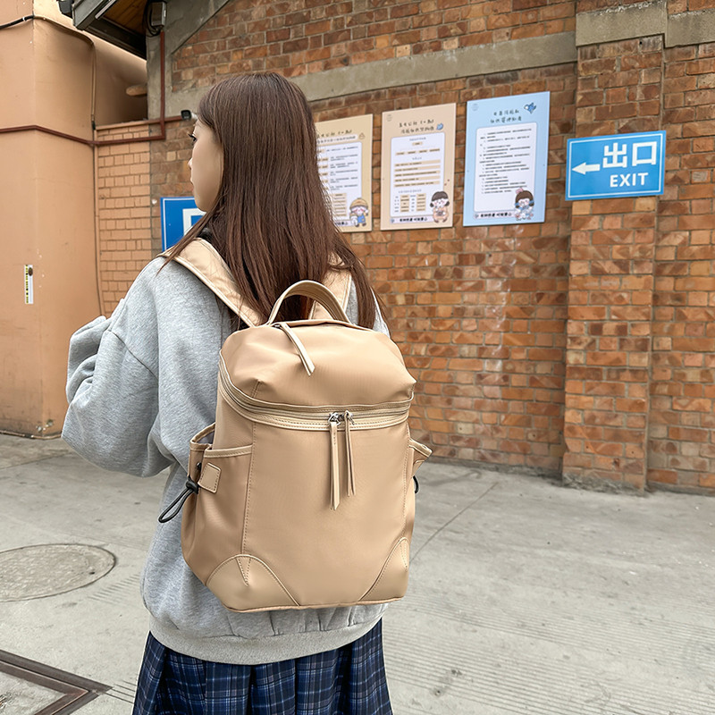 港风个性撞色水桶双肩包小清新尼龙布旅行背包女生时尚休闲旅行包