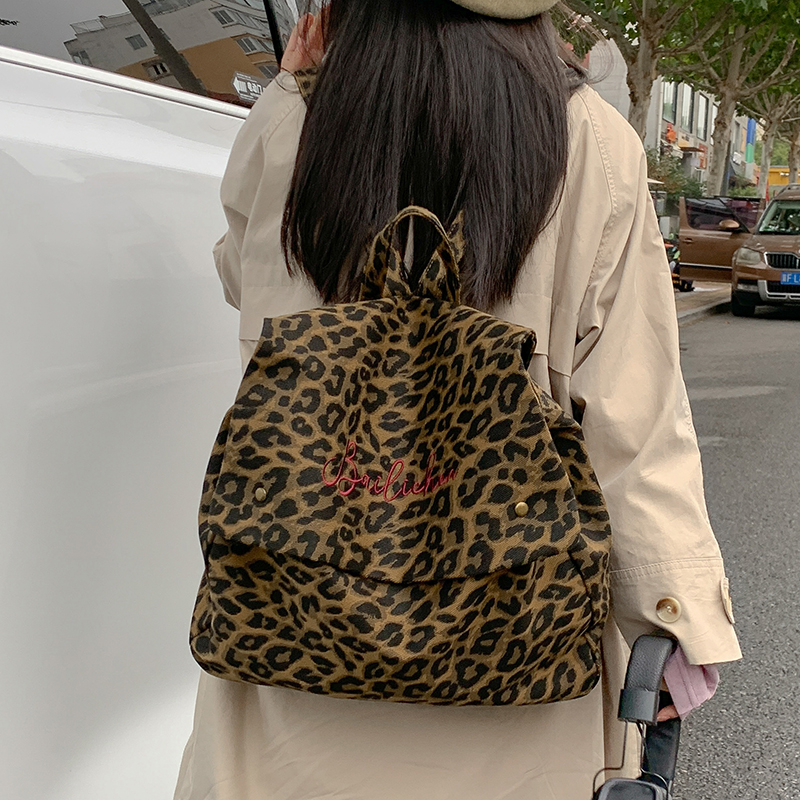 欧美风豹纹双肩包女大容量加厚耐磨帆布学生书包个性旅行辣妹背包