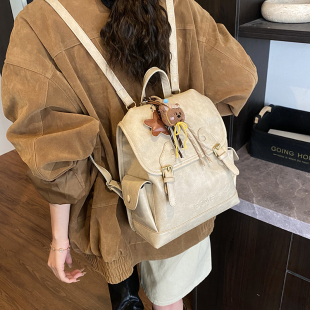 小众设计囧字双肩包女冬季 复古翻盖背包卡通可爱熊猫眼小书包 新款