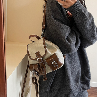 韩国复古拼接双肩包女2025新款小众设计翻盖小背包通勤撞色小书包