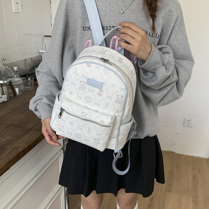 原创设计卡通可爱小猫双肩包少女感雾霾蓝小书包甜妹通勤旅行背包