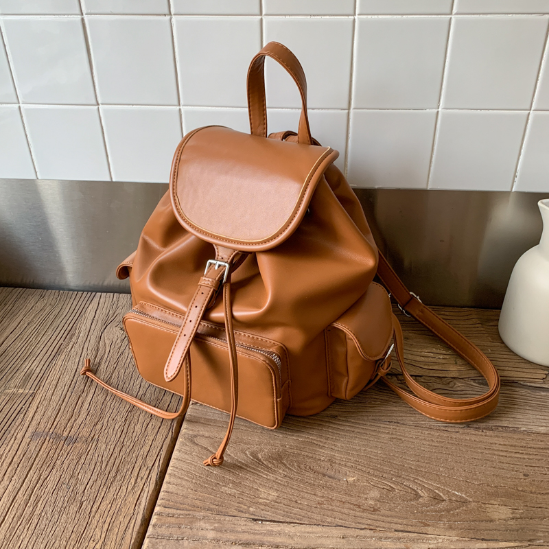 欧货松弛感抽绳水桶双肩包女士复古多口袋旅行背包美式大容量书包