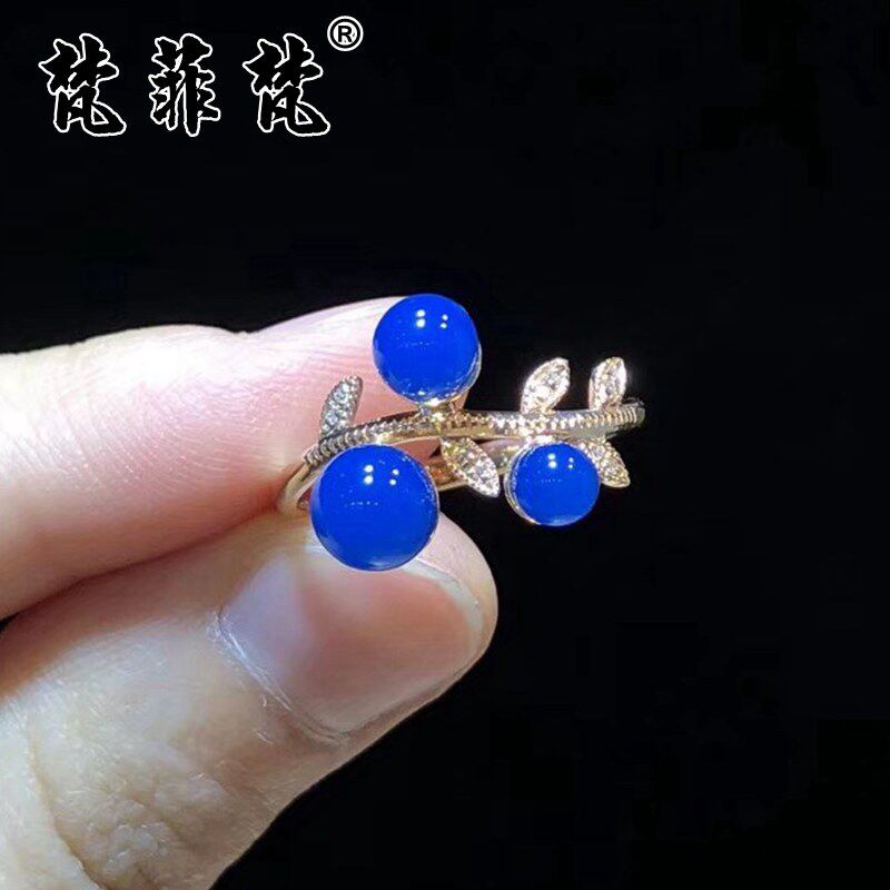 梵菲梵多米尼加蓝珀戒指枝叶18K金钻石镶嵌天然净水天空蓝琥珀戒