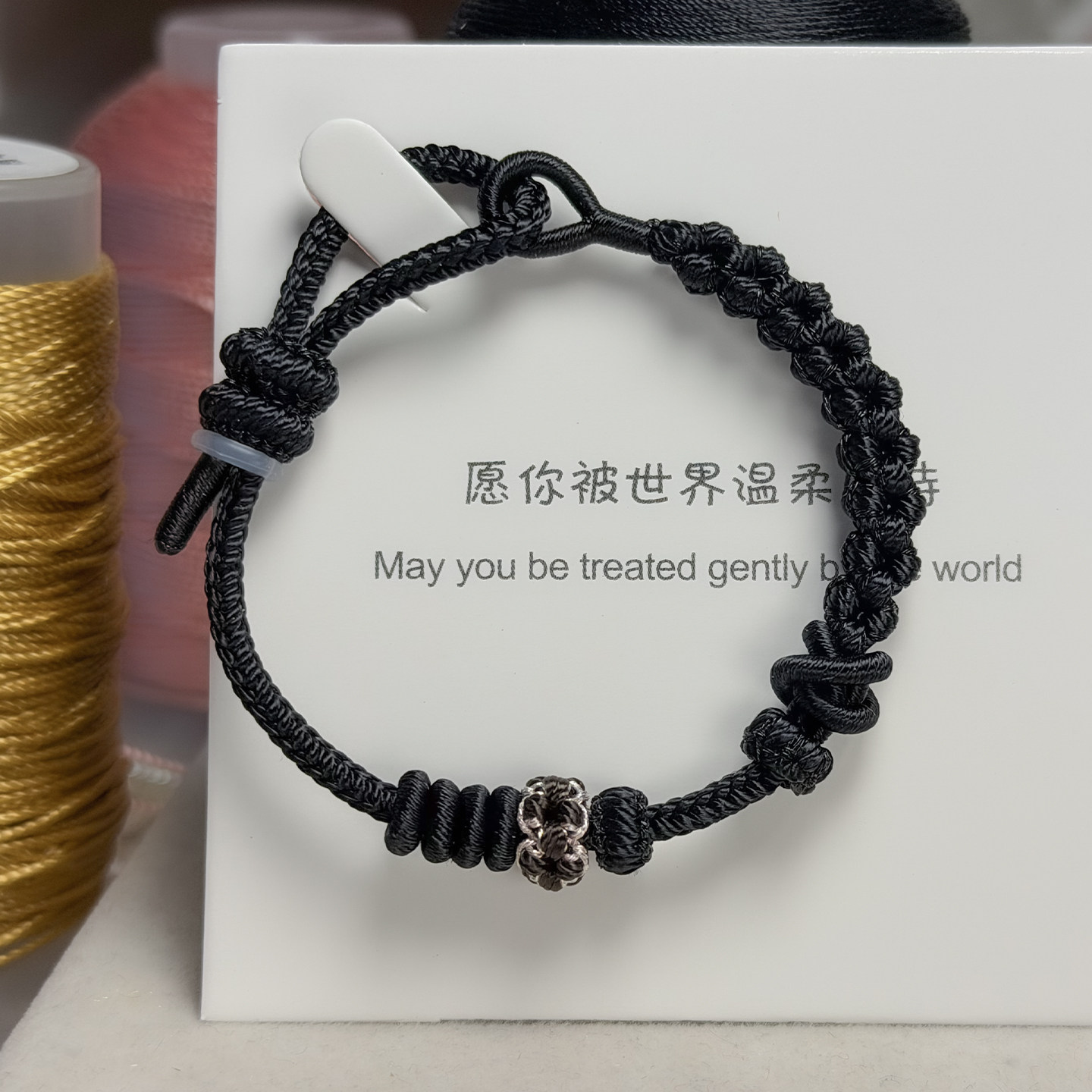 手工编织桃花双联结转运手绳图片