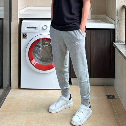 耐克男宽松透气收脚运动长裤