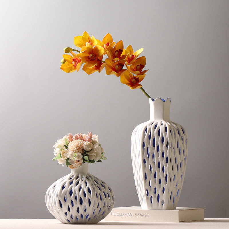简约现代创意镂空杨桃花瓶样板房酒店轻奢插花装饰品摆件台面陶瓷