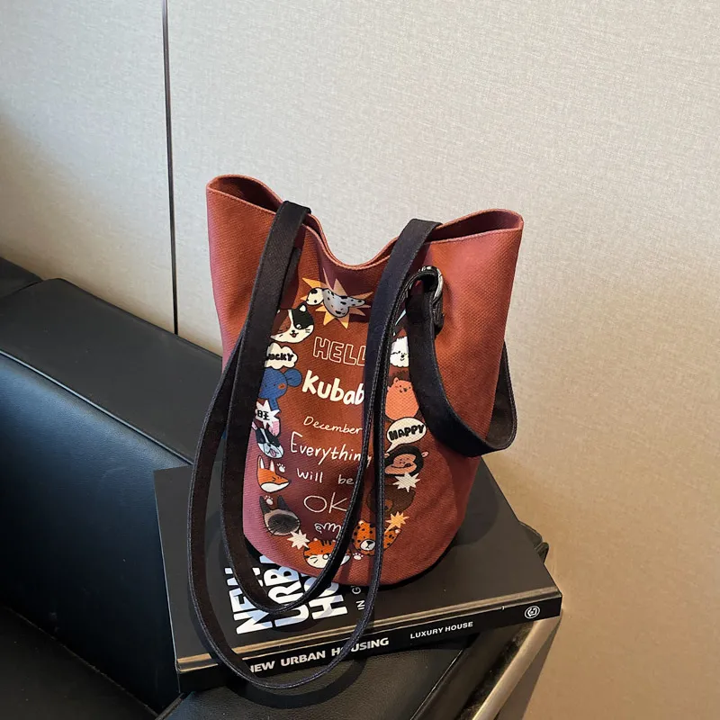 跨境插画水桶包大容量ins印花帆布包时尚潮流手提包女士逛街包包