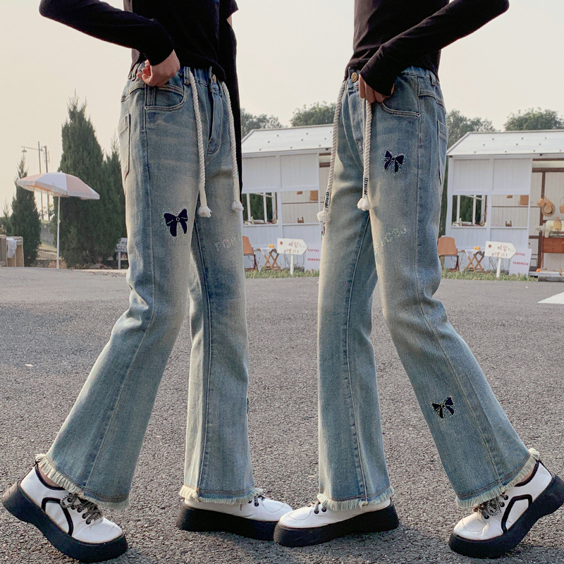 女童毛边牛仔长裤春秋2025新款中大童裤子春装儿童洋气宽松喇叭裤