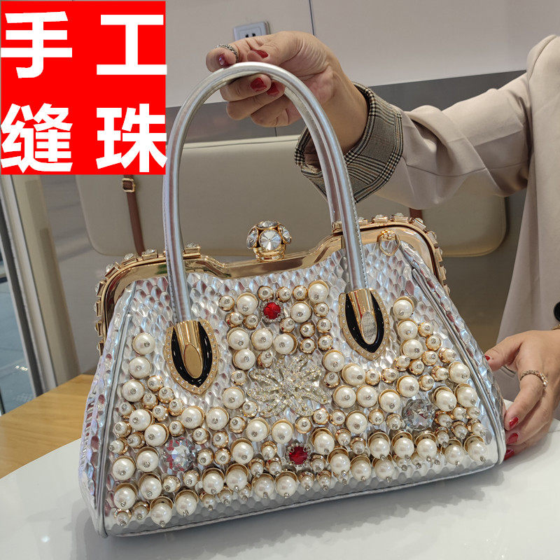 贝壳包手工缝珠大欧美时尚镶钻