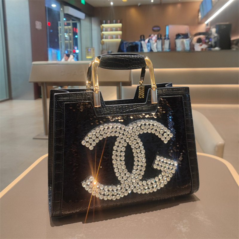 简约镶钻真皮手提包女大容量斜挎