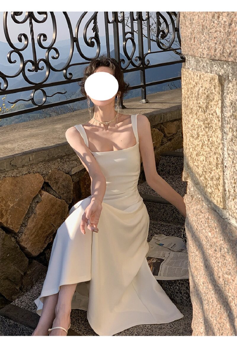 性感露肩背吊带白色礼服女轻奢小众高端级名媛气质收腰A字连衣裙