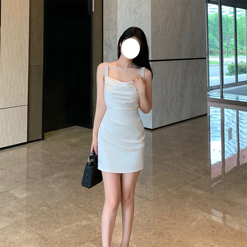 法式性感吊带露背白色礼服轻奢小众高端级名媛气质收腰包臀连衣裙