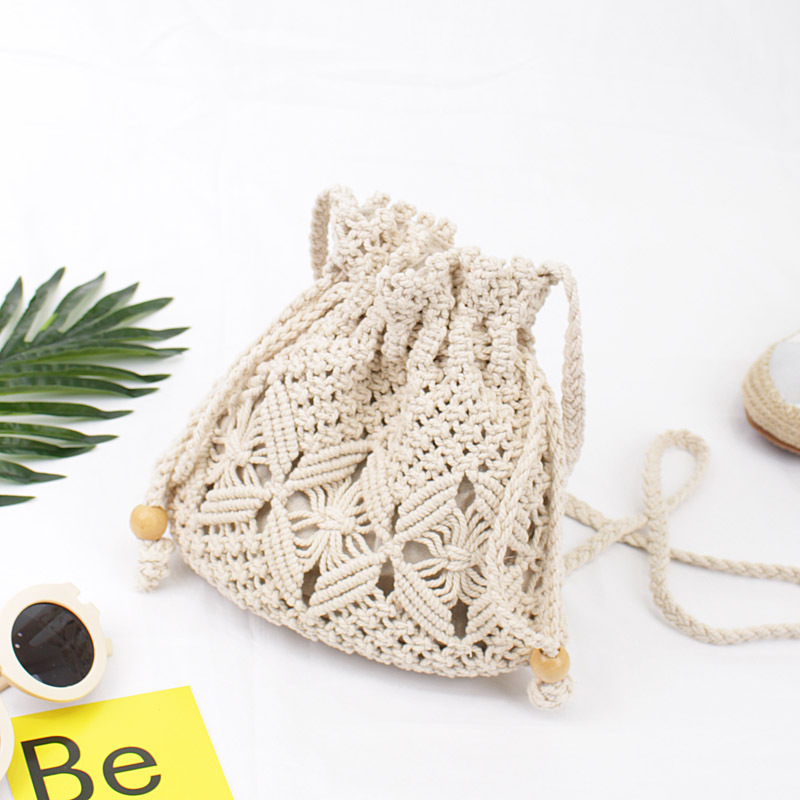 森女日韩复古棉麻手工抽绳斜挎包